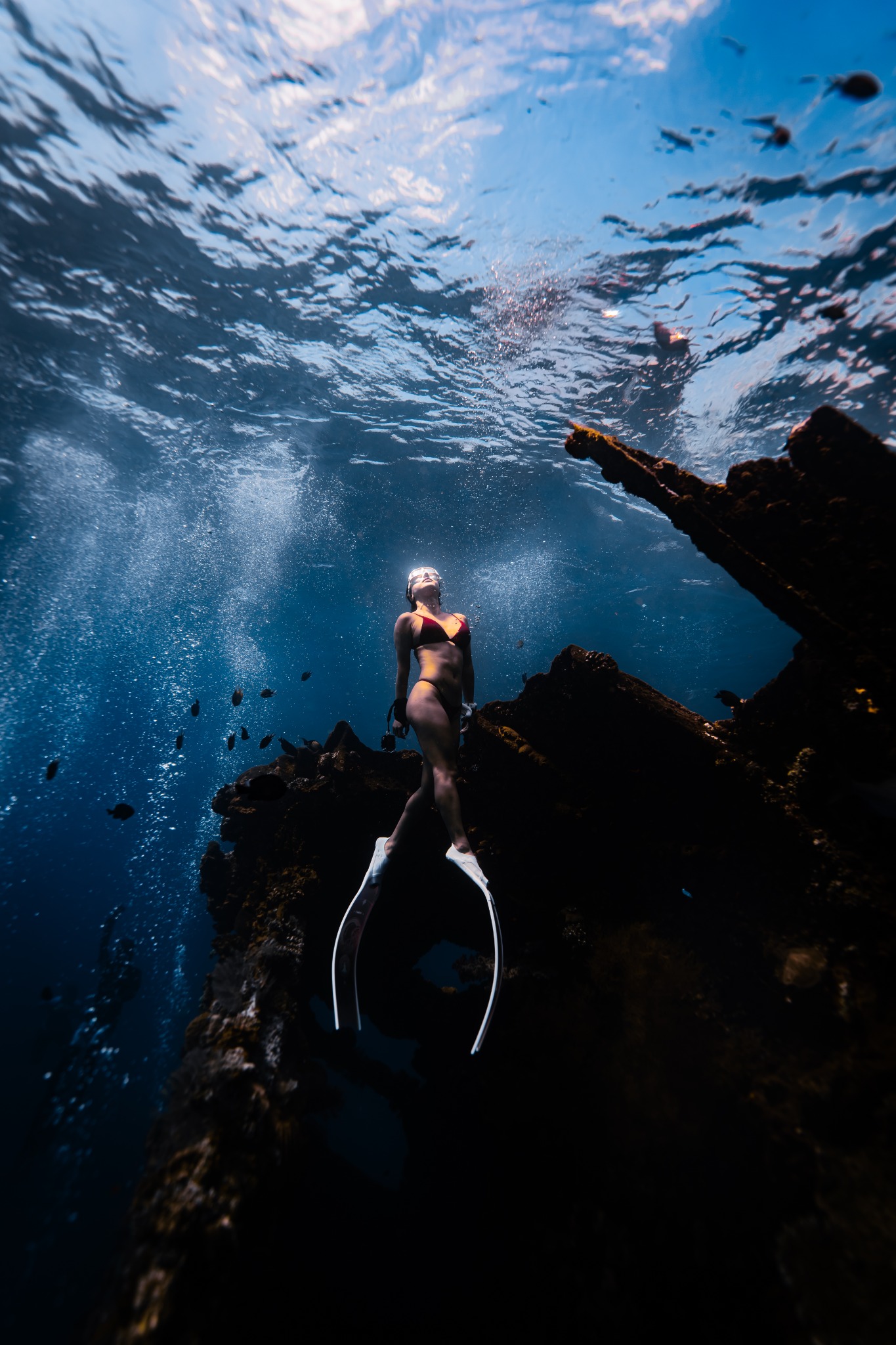 Freediver in clear blue water