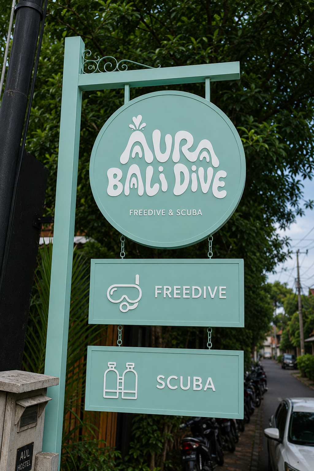 AURA Bali Dive sign in Amed